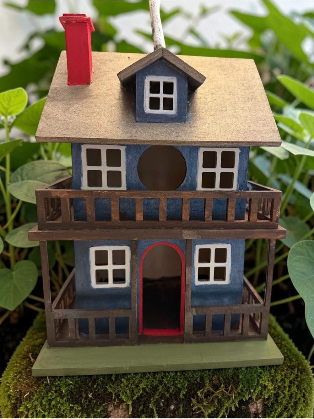 Blue Wooden Birdhouse Perch with Red Accents